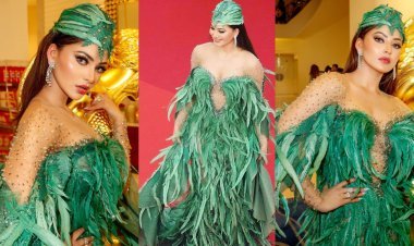 "Cannes Film Festival: Urvashi Rautela stuns in Ziad Nakad's extravagant green feather headgear, turning heads on the red carpet"
